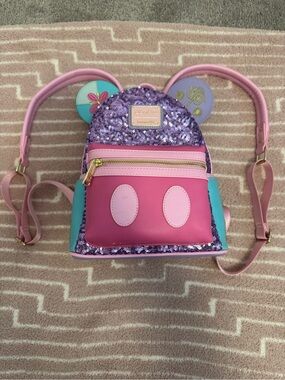 Disney main attraction “it’s a small world” backpack